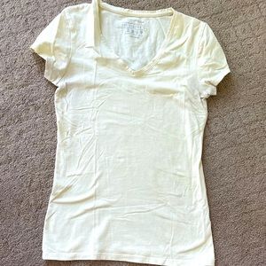 Stretchy v-neck pastel yellow shirt